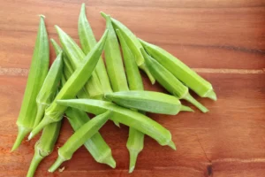 Fresh organic okra pods, perfect for making okra-infused water.